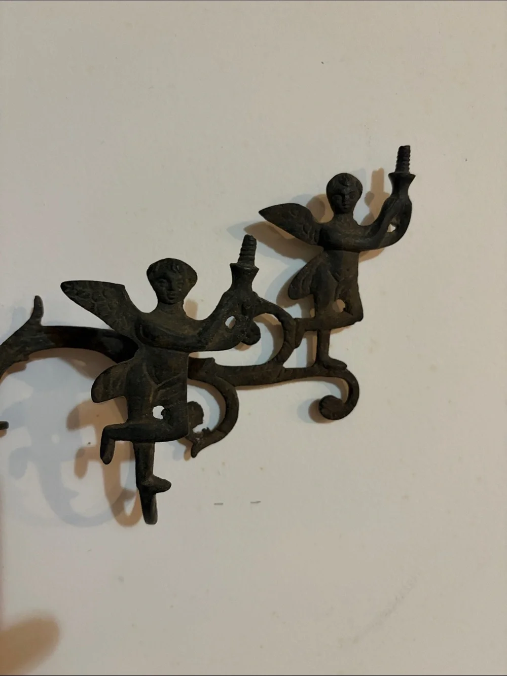 Cast iron coat rack with Cherubs. Mid century or earlier?